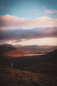 Scenic view of landscape against sky during sunset