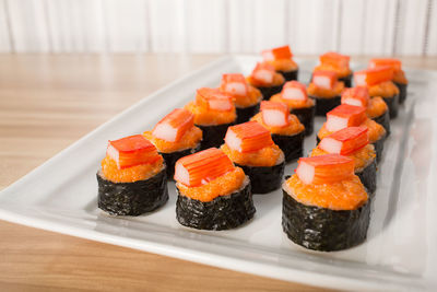 Close-up of sushi in plate on table