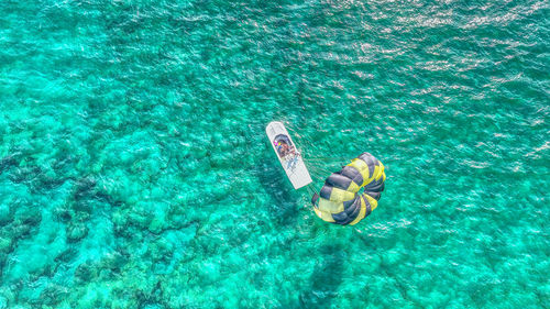 High angle view of person swimming in sea