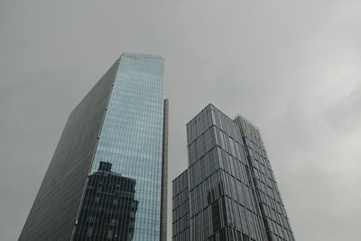 Low angle view of modern building against sky