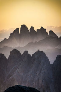Scenic view of dolomites against sky during sunset