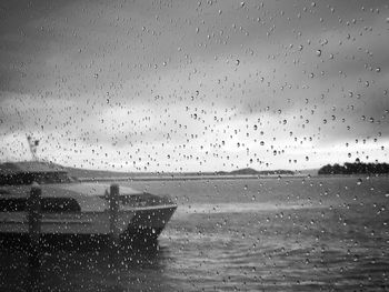 Raindrops on sea against storm clouds