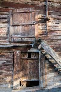 Close-up of old wooden door of building