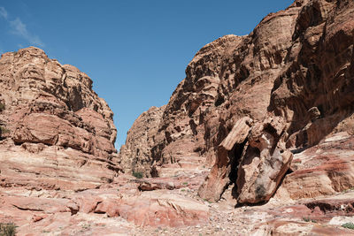 Scenic view of rocky mountains against clear sky