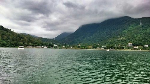 Scenic view of sea against cloudy sky