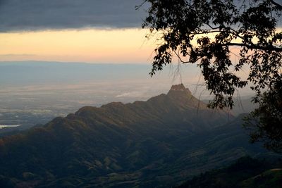 Scenic view of mountain against sky during sunset