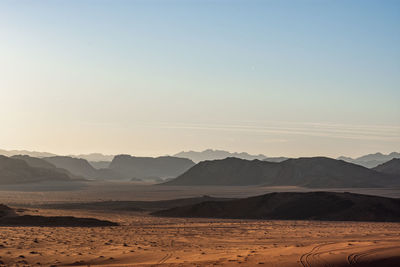 Scenic view of desert against clear sky