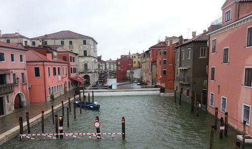 View of canal along buildings