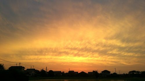 Scenic view of dramatic sky during sunset