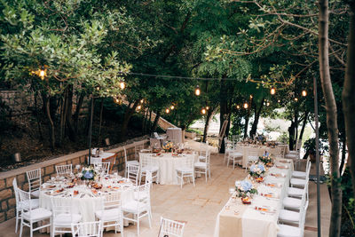 High angle view of chairs and tables at restaurant