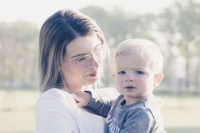 Morning bliss, mother and child in park