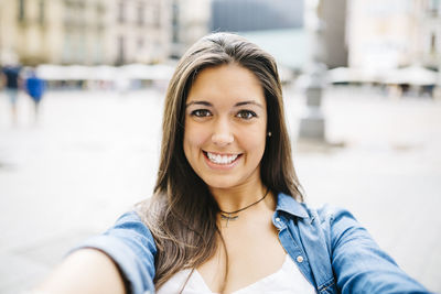 Portrait of smiling young woman