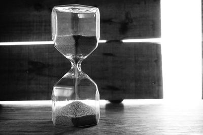 Close-up of clock on table