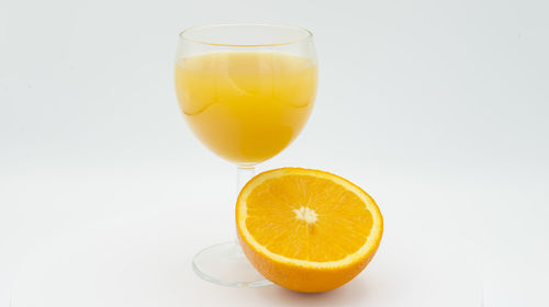 Close-up of drink against white background