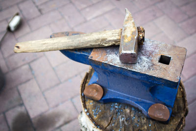 High angle view of rusty metal on table