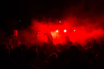 Silhouette of people enjoying in concert