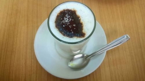 Close-up of cappuccino on table