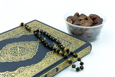 High angle view of food on table against white background