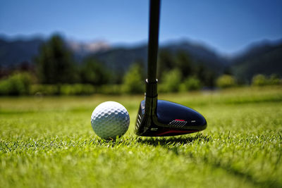 Close-up of golf ball on grass