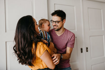 Father and son with daughter