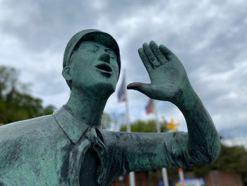 Close-up of statue against sky