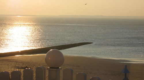 Scenic view of sea at sunset