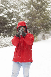 Full length of a person standing in snow