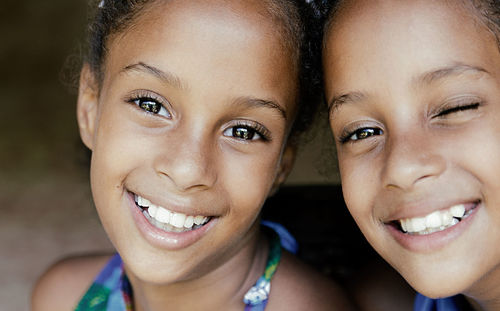 Close-up portrait of smiling girls