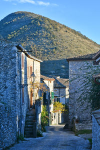 A street between old houses in pico, a medieval village in lazio, italy.