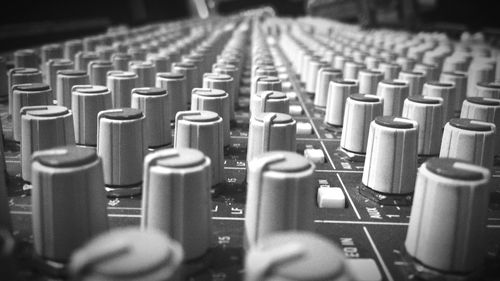 Close-up of sound mixer in studio