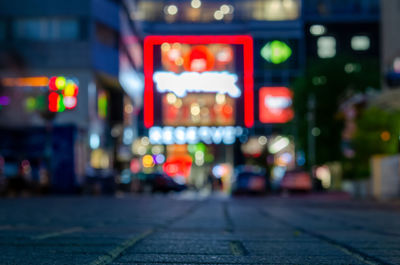 Close-up of illuminated street at night