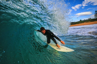 Man surfing in sea