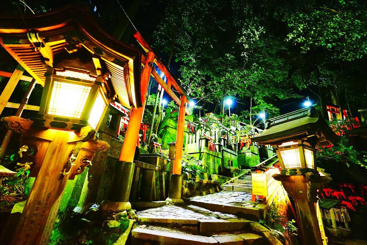 LOW ANGLE VIEW OF ILLUMINATED BUILDING