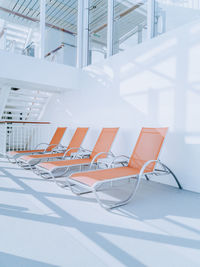 Empty chairs and table in office