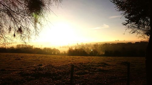 Scenic view of landscape against sky during sunset