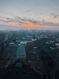 High angle view of townscape against sky at sunset