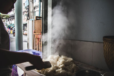 Man preparing food in kitchen