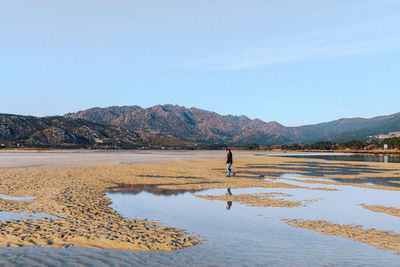Scenic view of lake against clear sky