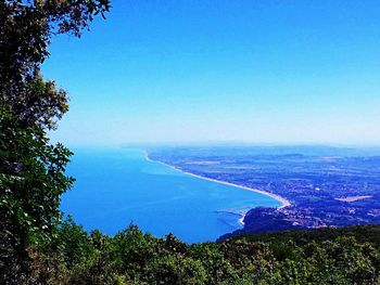 Scenic view of landscape against blue sky