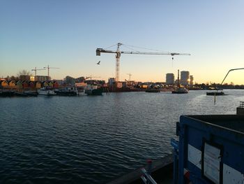 Scenic view of sea against clear sky during sunset
