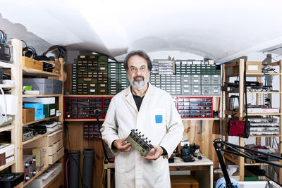 Electronic engineer is working in his laboratory