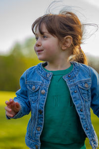 Cute girl standing outdoors