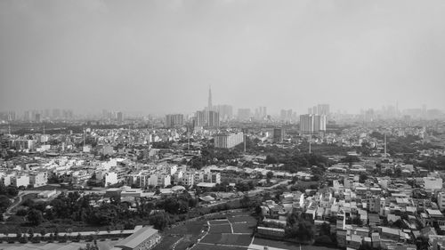 High angle view of buildings in city against clear sky