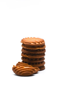 Close-up of cookies against white background