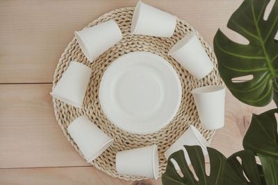 High angle view of coffee cups on table