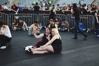 People sitting on street
