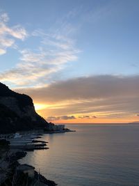 Scenic view of sea against sky at sunset
