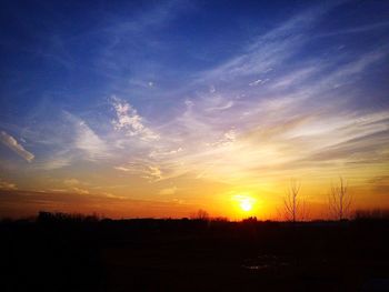 Scenic view of landscape at sunset