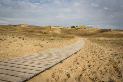 Boardwalk leading through desert