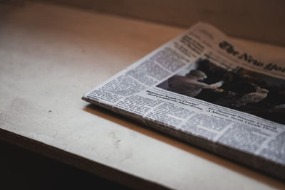 High angle view of open book on table